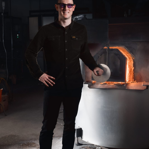 Australian glass artist Llewelyn Ash in his Adelaide glassblowing studio