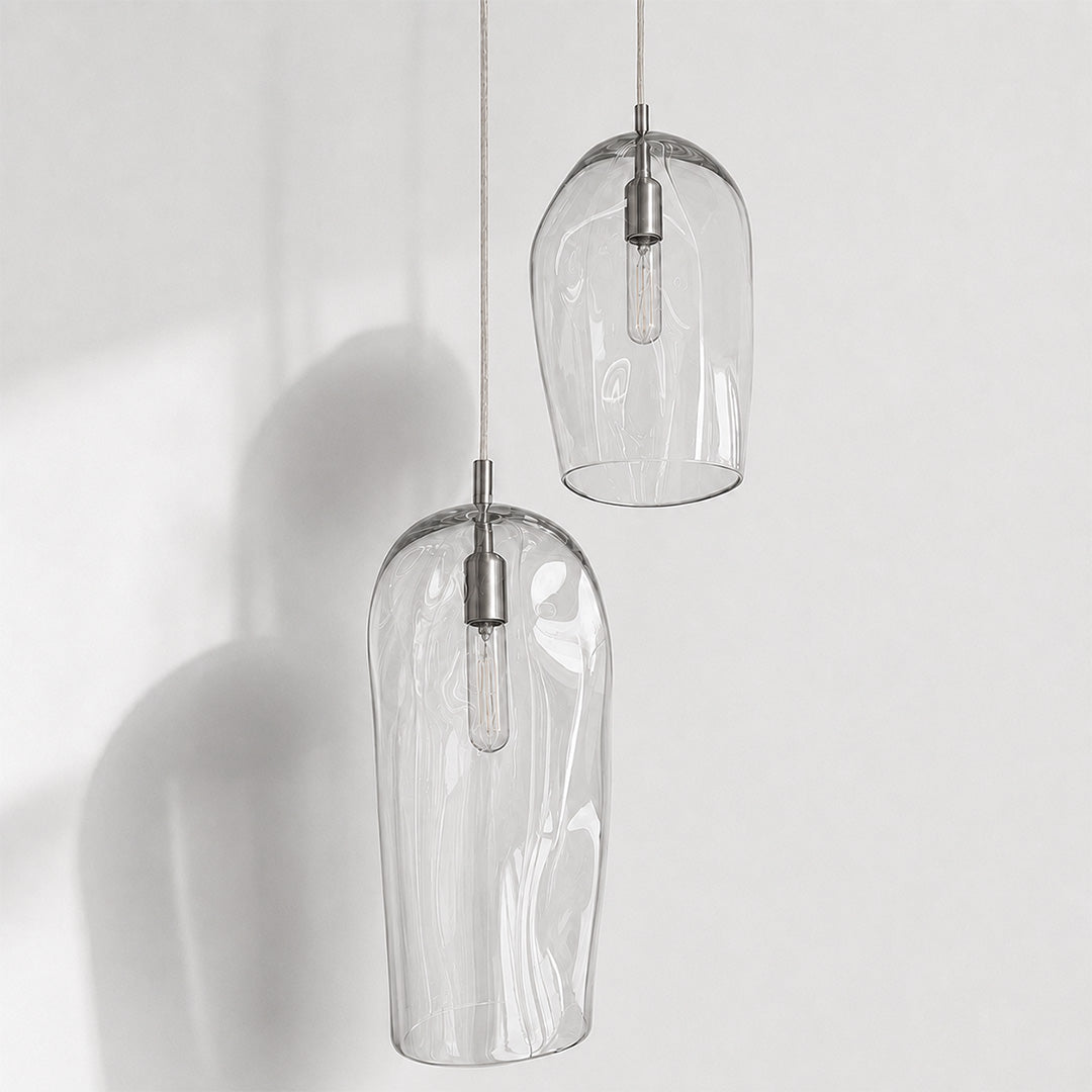 Marea Clear Australian made handblown glass pendant lights by Contemporary Co in two sizes with stainless steel fittings, shown unlit.