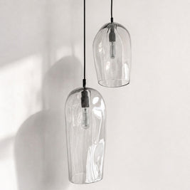 Marea I and Marea II Clear Australian made handblown glass pendant lights with black fittings, shown unlit.