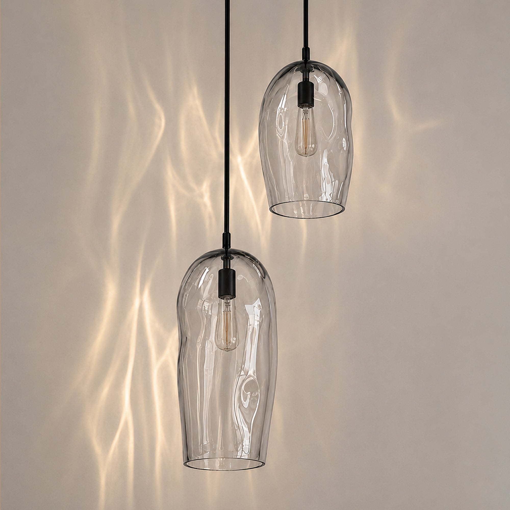 Traditional glassblowing process used to create the Marea Collection pendant lights in South Australia.