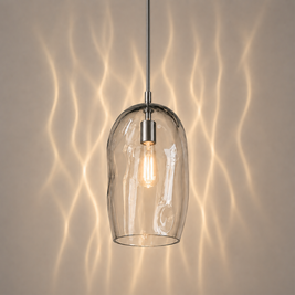 Marea I amber handblown glass pendant light switched on showing the natural glass colour.