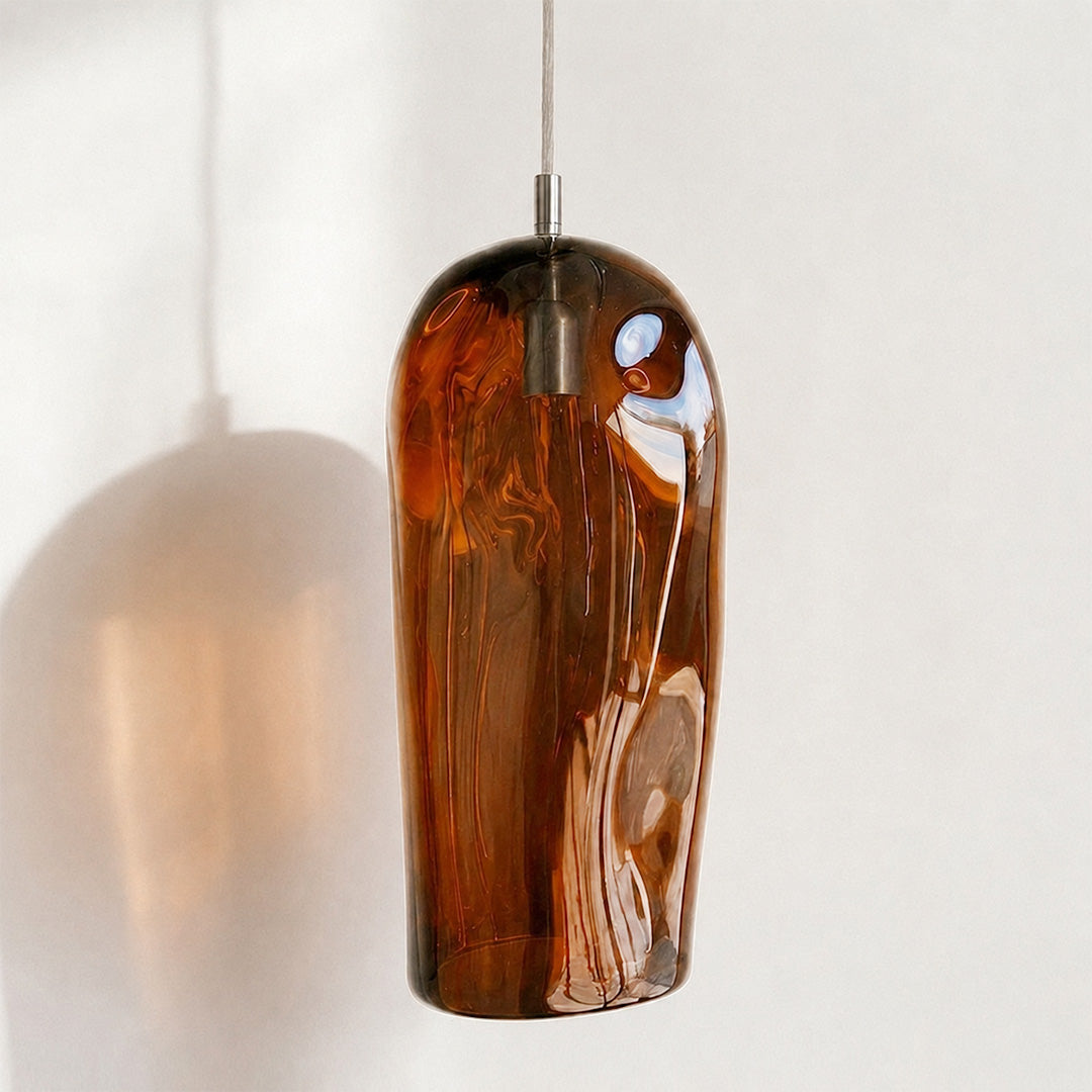 Marea II Amber Australian made handblown glass pendant light by Llewelyn Ash with stainless steel fitting, shown unlit.