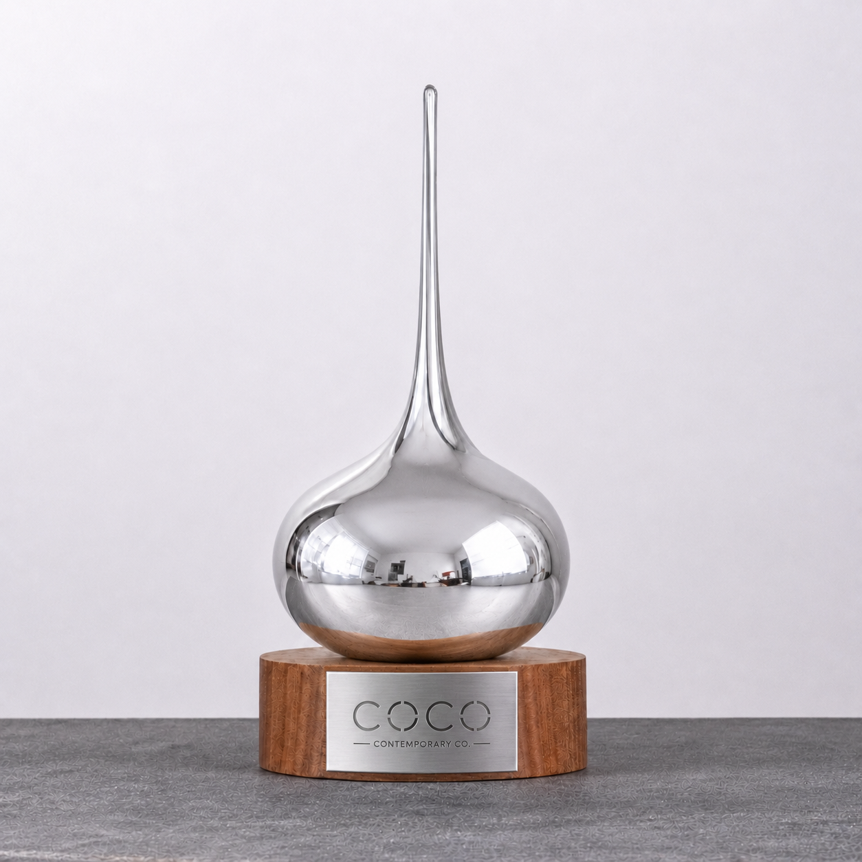 Handcrafted silver Lucky Drop glass award on a timber base by Contemporary Co – premium Australian corporate award and executive recognition trophy.