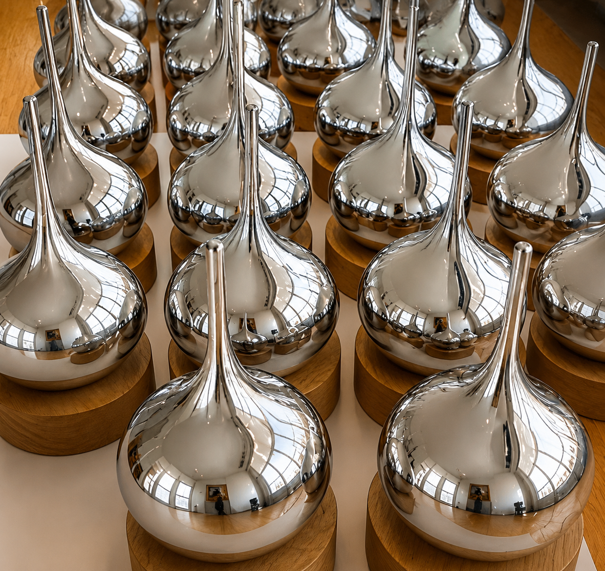 Contemporary Co Silver Lucky Drop Award – handcrafted Australian glass corporate award on a timber base for employee recognition, leadership awards and business excellence.