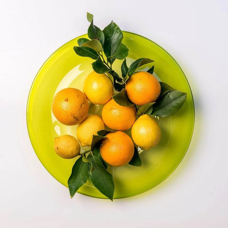 Handblown glass award platters by Llewelyn Ash handcrafted in Australia. Custom engraved corporate award platters available in blue, green and ruby pink.